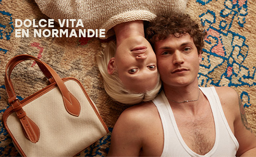 Beige canvas and leather handbag