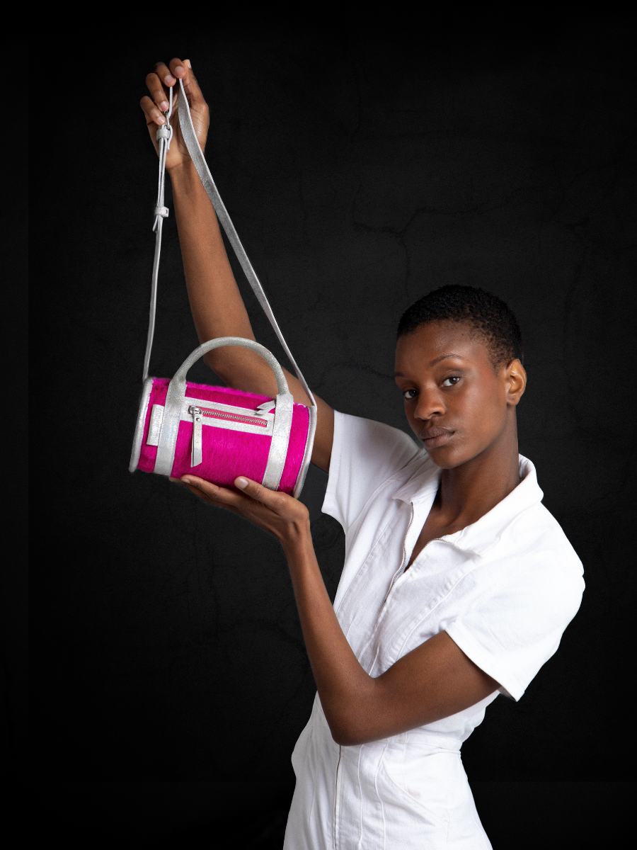 pink-leather-shoulder-bag-charlie-creature-acid-pink-paul-marius-ambient-view-picture-w30-crea-s-pi