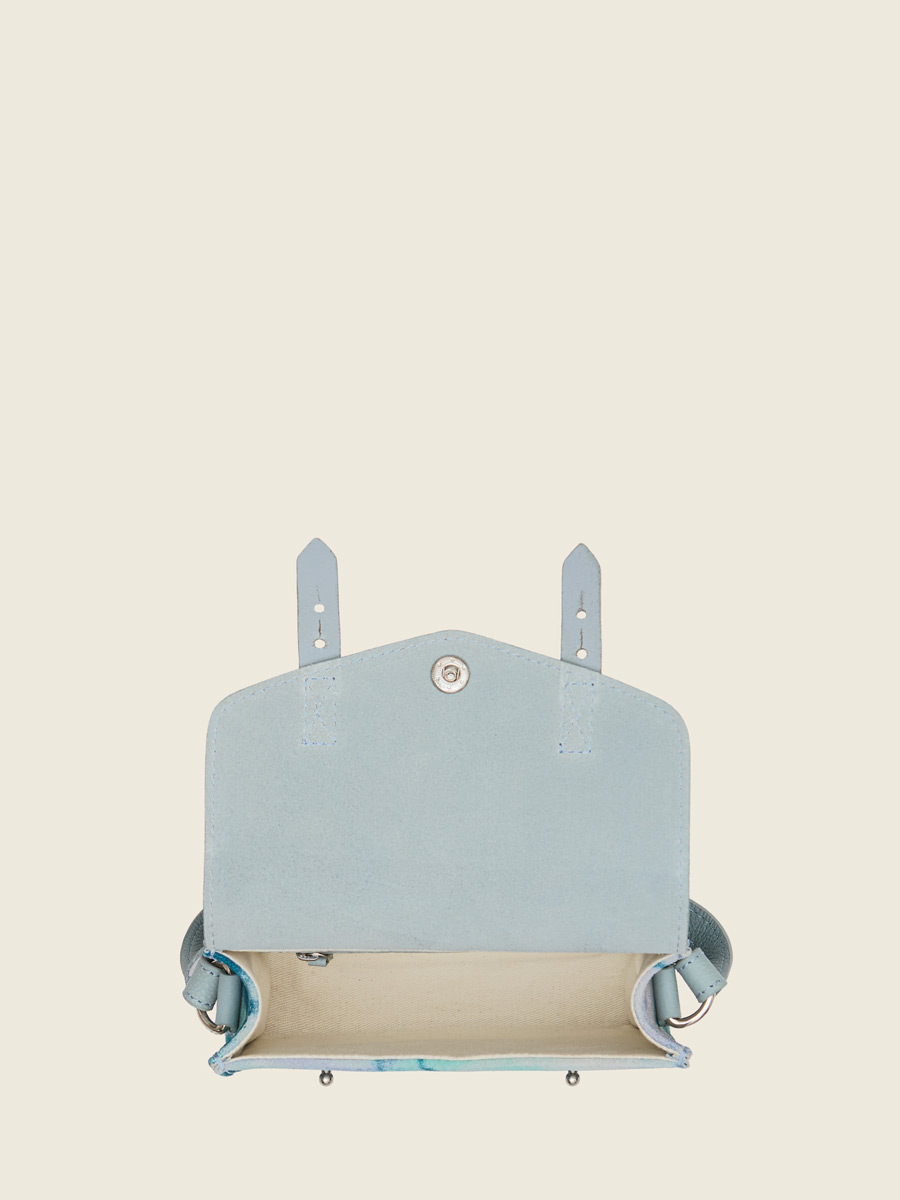 Small blue leather crossbody bag LeMini Indispensable - Tie & Dye Blue ambient view