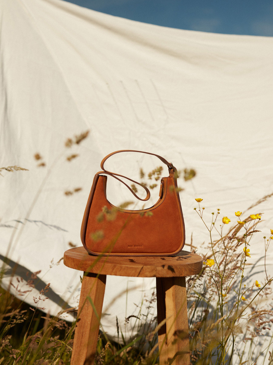 mini-baguette-bag-brown-leather-victoire-xs-brick-ambient-view-w54xs-su-co