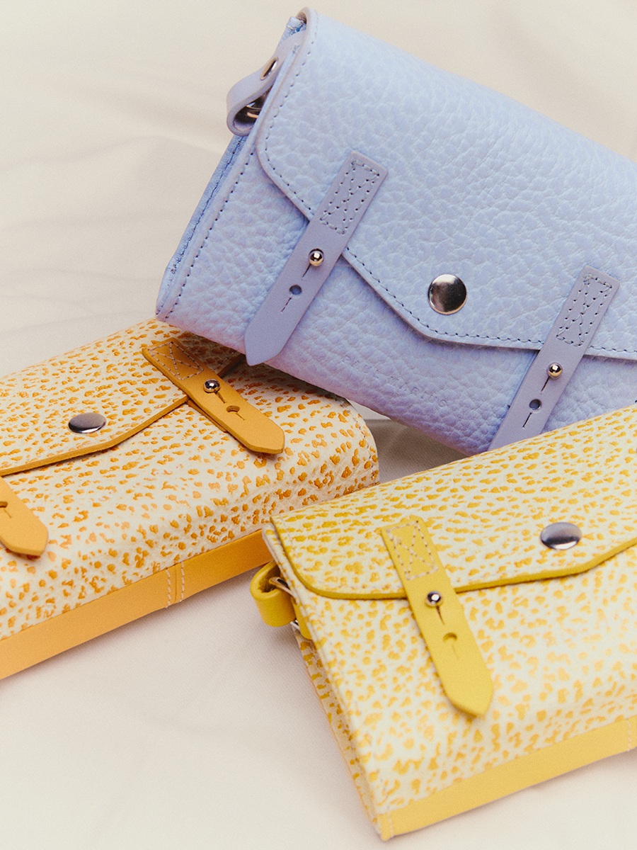 Small purple leather crossbody bag LeMini Indispensable - Lavender side view