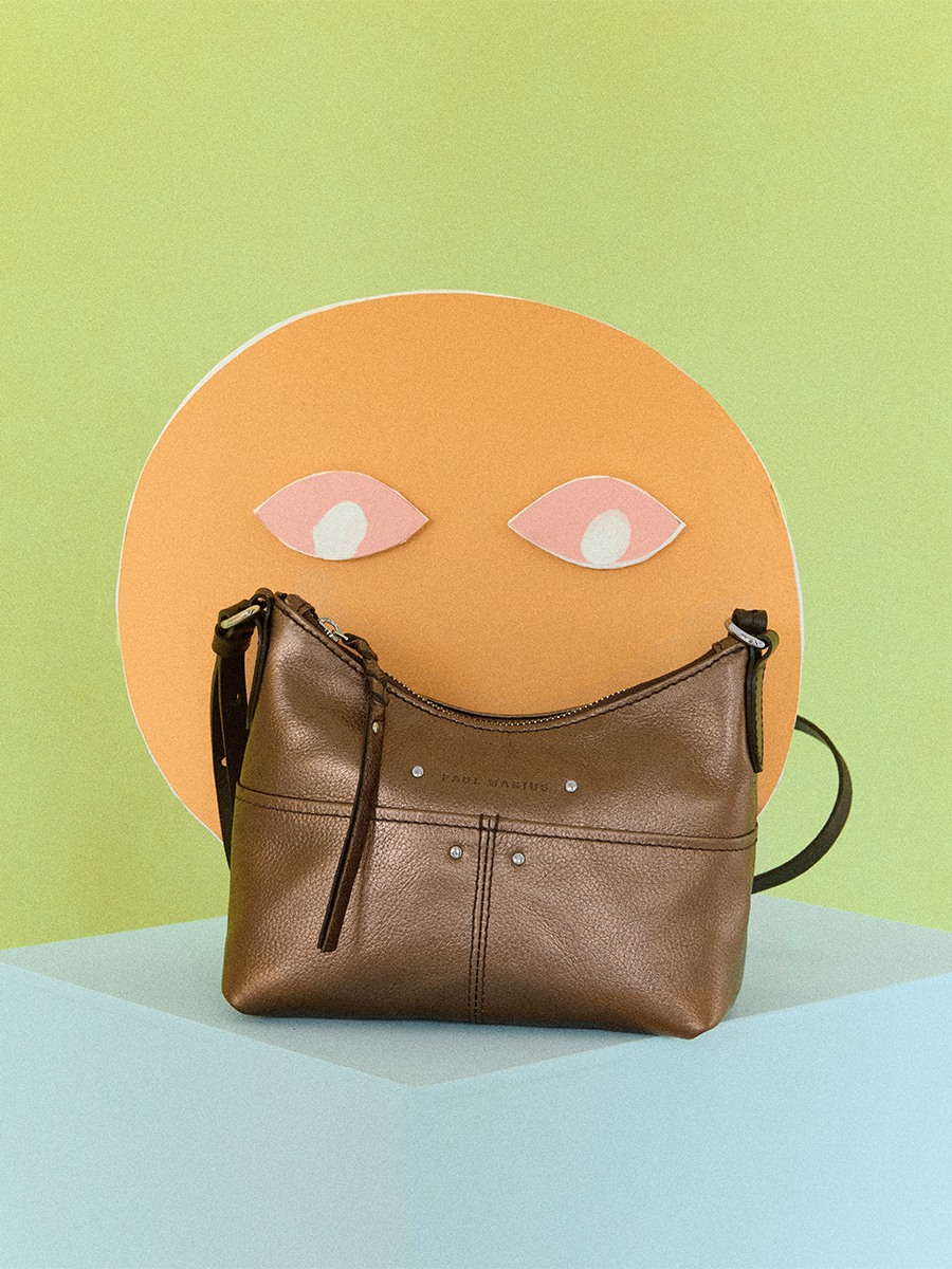 Lifestyle photo, small copper leather shoulder bag, PAUL MARIUS LeLoustic Copper