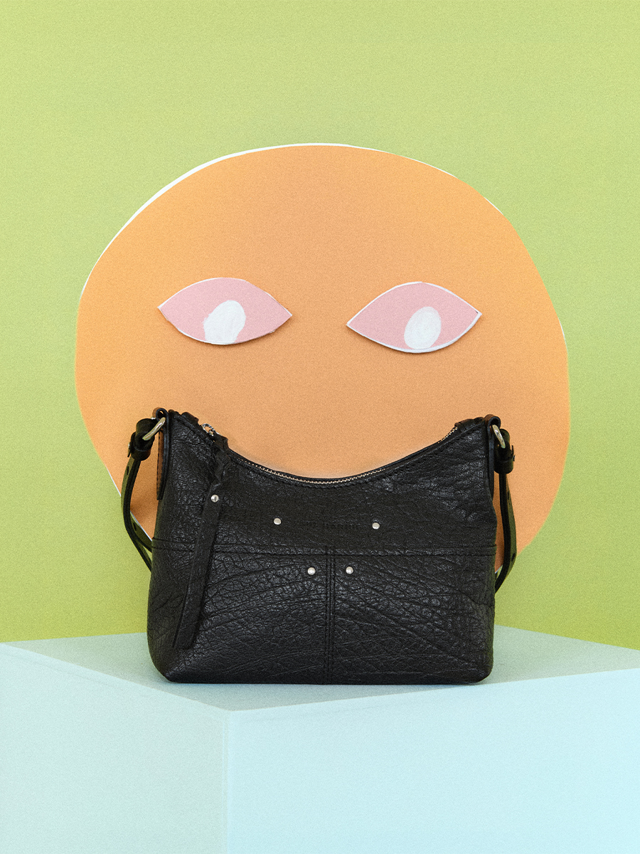 Lifestyle photo, small black leather shoulder bag, PAUL MARIUS LeLoustic Black